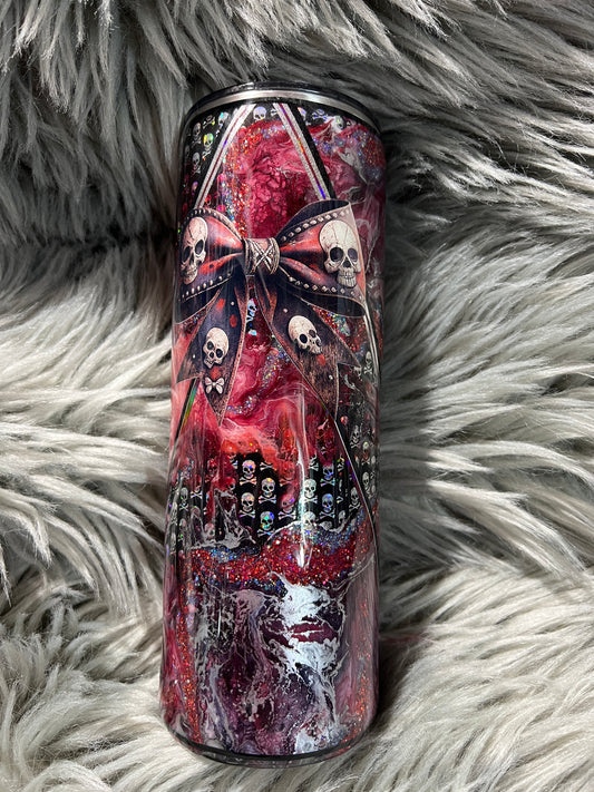 RTS.  Red reverse marble with skulls and a bow 20oz